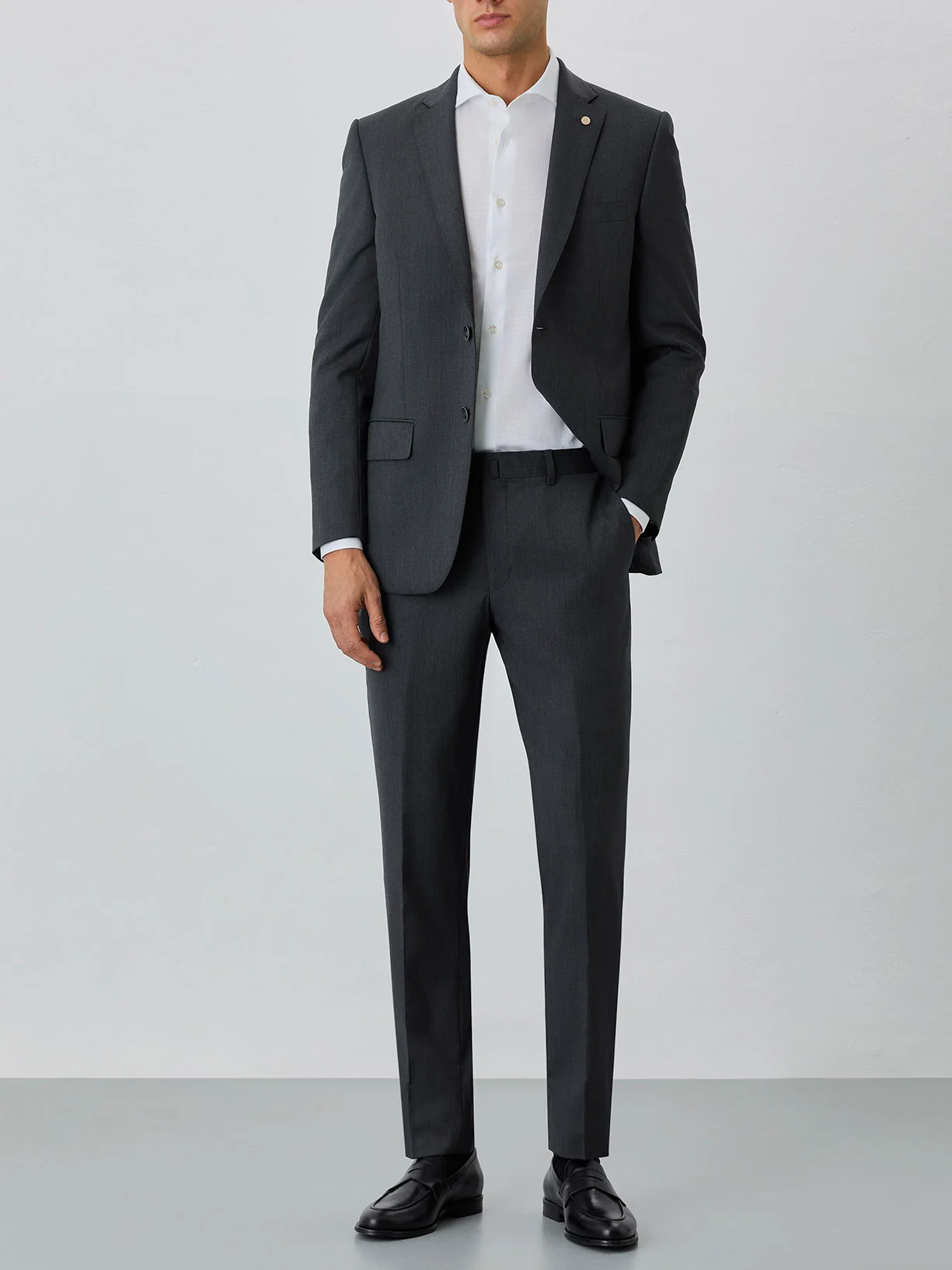 Fato business slim fit em tecido espinha